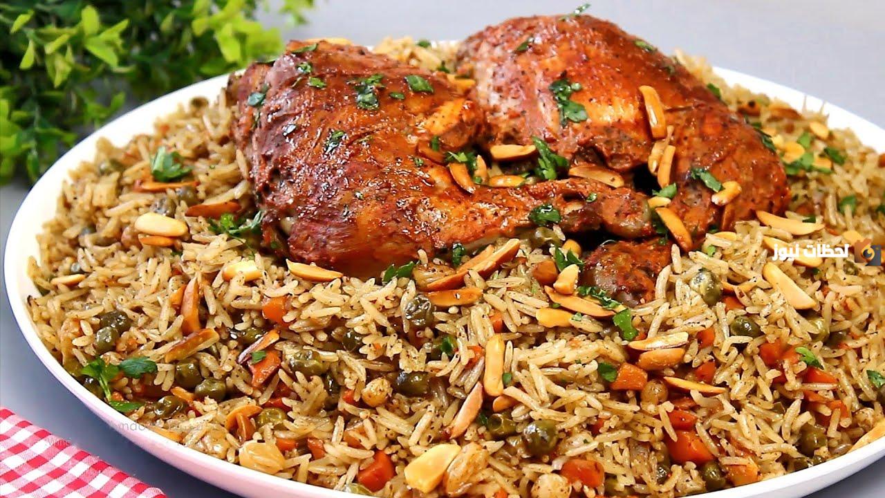 طريقة عمل الرز المبهر بالدجاج على الطريقة الأسبانية.. أكلة مش هتفارق بالك