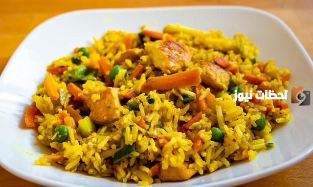 طريقة عمل الرز المبهر بالدجاج على الطريقة الأسبانية.. أكلة مش هتفارق بالك