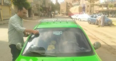 رئيس مدينة منوف يتابع وضع ملصقات تعريفة التاكسي الجديدة رئيس مدينة منوف يتابع وضع ملصقات تعريفة التاكسي الجديدة