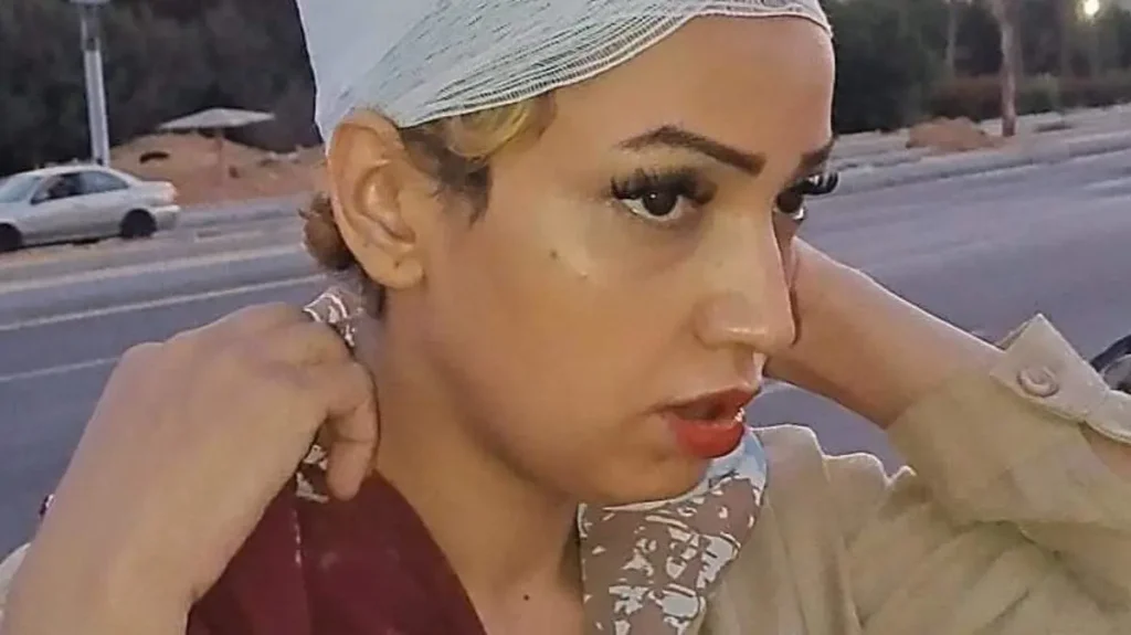 سحلها وحلق شعرها